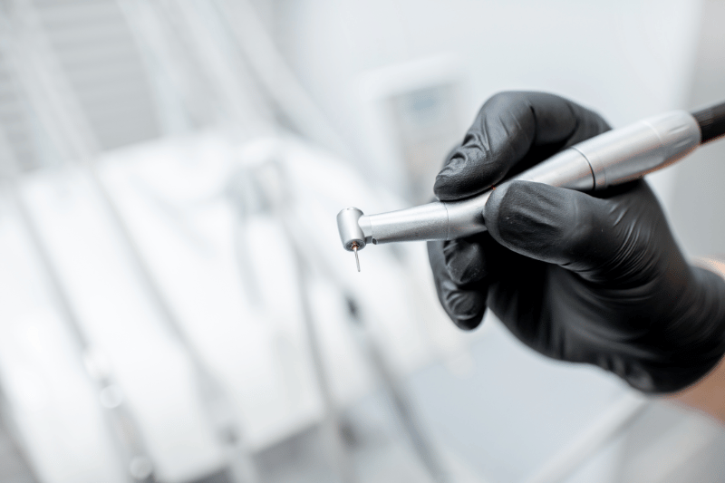 dental hand drill in use