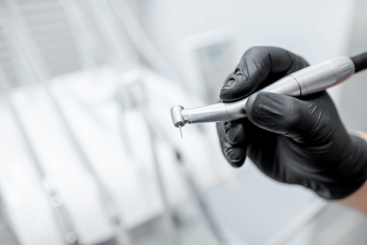 dental hand drill in use